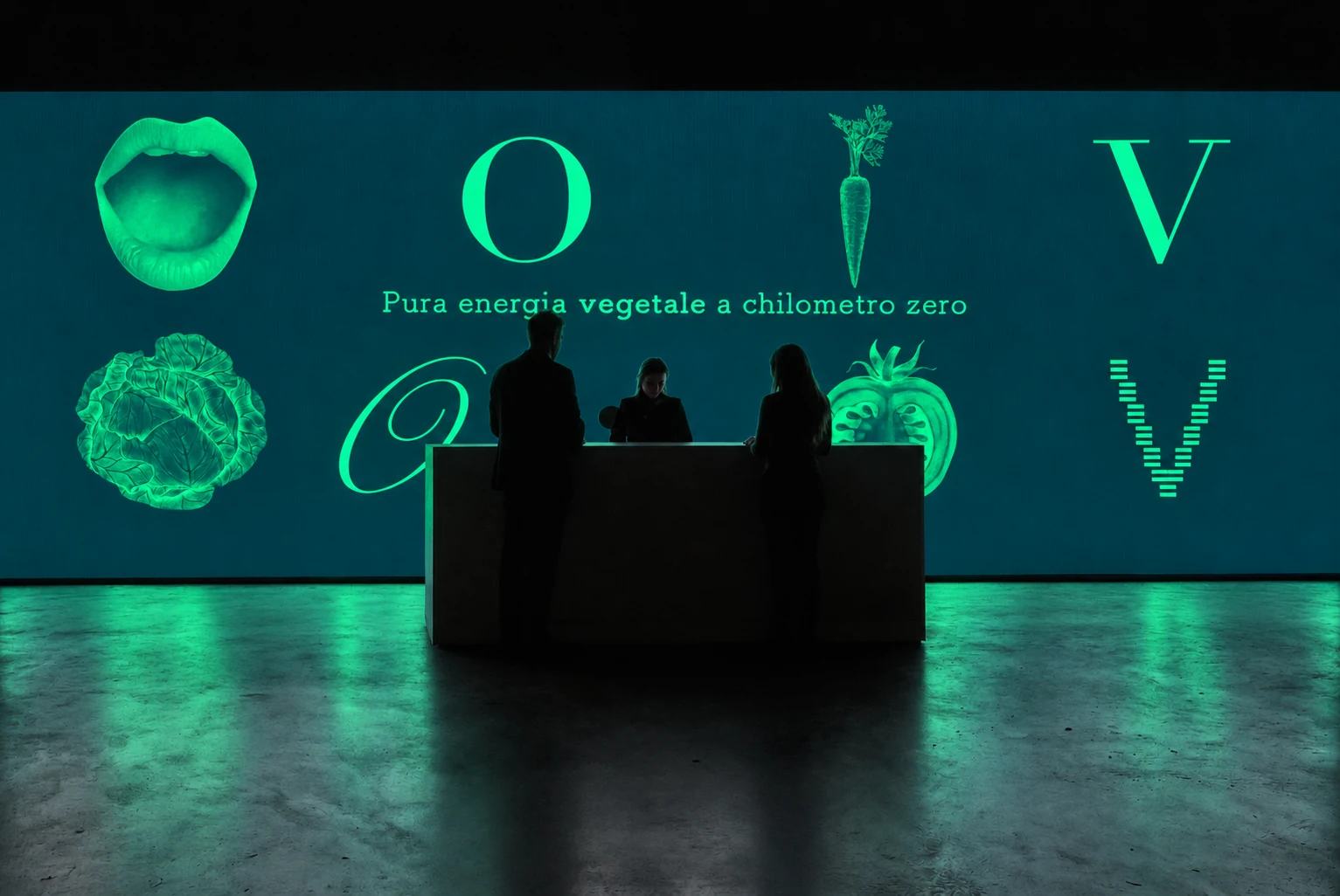 Il linguaggio di Opzione Vegetale su uno schermo panoramico, con riflessi verdi sul pavimento