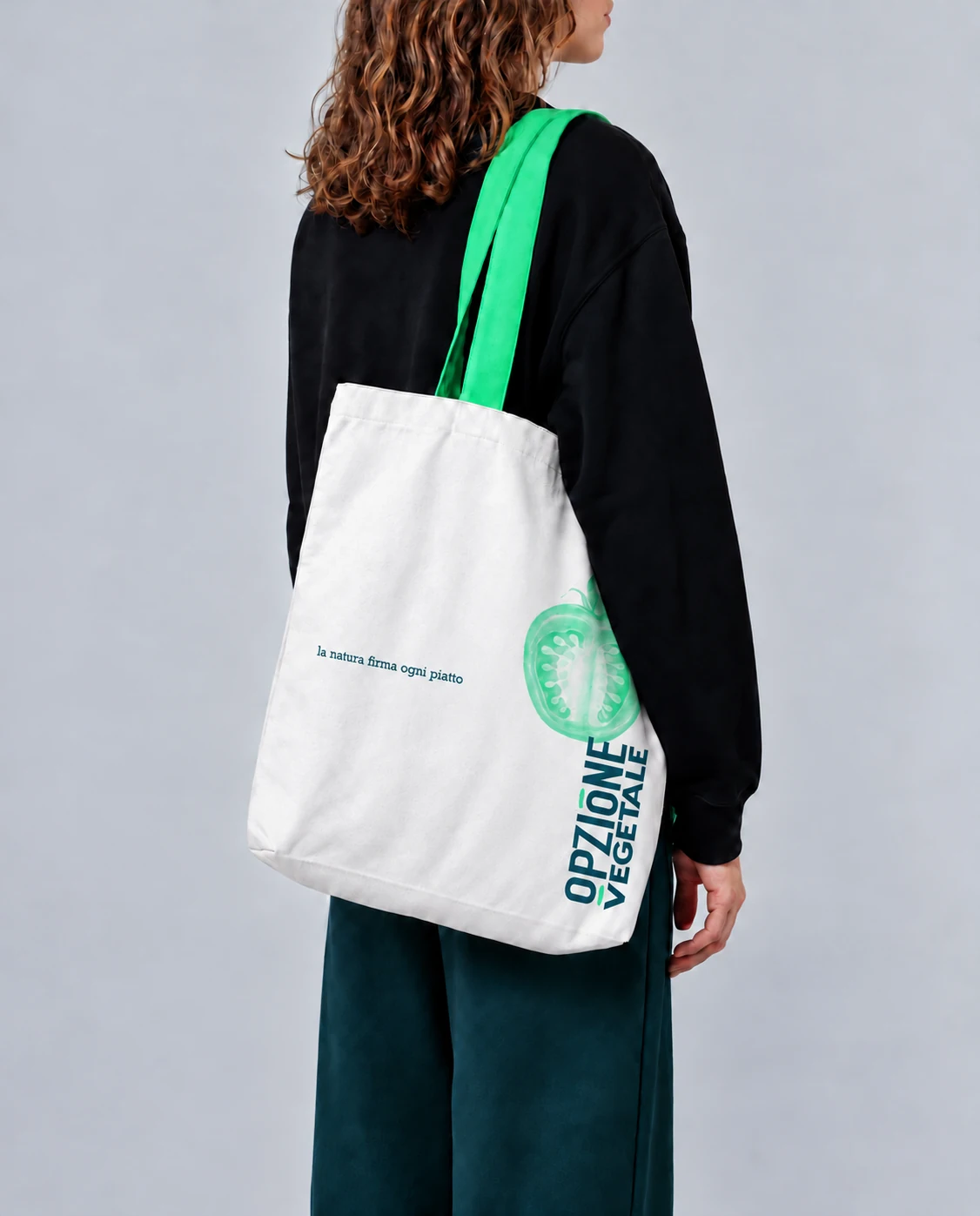 Tote bianca con manici verdi, botanica del pomodoro e firma Opzione Vegetale